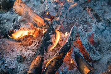 the embers of the fire wood burning