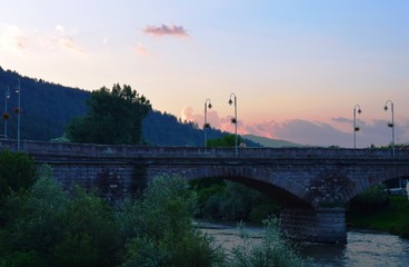 Fototapeta premium old stone bridge in the evening