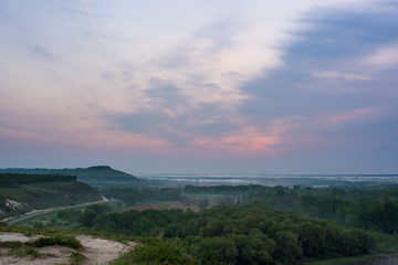 dawn on river. fog on the river. pink dawn sky