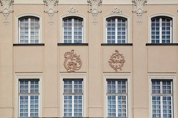 Window decoration of buildings of Krakow suburb street.