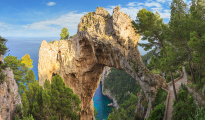 The natural arch in Capri, Italy. A view looking back to the elephant shaped, natural arch from the coastal path on the island of Capri.