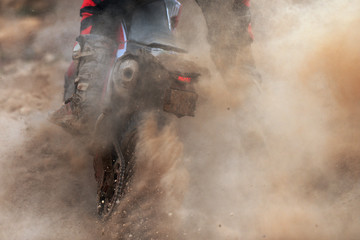Motocross racer accelerating speed in track,driving in the motocross race