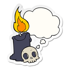 cartoon skull and candle and thought bubble as a printed sticker