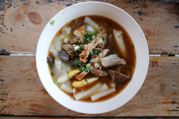 noodles or pork noodle with egg and tofu