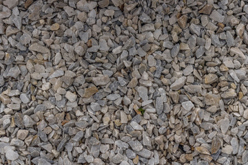 pebble texture small pebbles. gravel, building material or trash. abstract old backdrop retro vintage wallpaper