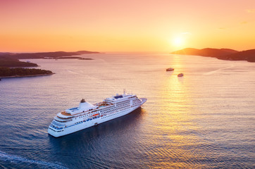Fototapeta Croatia. Aerial view at the cruise ship during sunset. Adventure and travel.  Landscape with cruise liner on Adriatic sea. Luxury cruise. Travel - image obraz