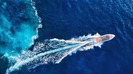 Croatia. Yachts at the sea surface. Aerial view of luxury floating boat on blue Adriatic sea at...