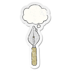 cartoon trowel and thought bubble as a distressed worn sticker