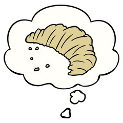 cartoon croissant and thought bubble