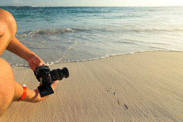 Man shooting nature sunset by camera