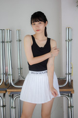 Portrait of thai adult beautiful girl black shirt white skirt relax time