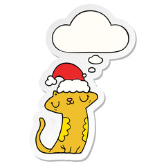 cute cartoon cat wearing christmas hat and thought bubble as a printed sticker