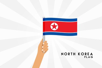 Vector cartoon illustration of human hands hold North Korea flag. Isolated object on white background.