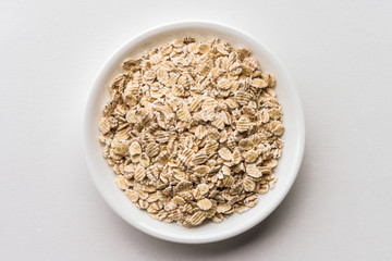 Rolled Barley Flakes in a Bowl