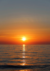 Obrazy na Szkle  Piękny zachód słońca nad Morzem Tyrreńskim w Toskanii, Włochy
