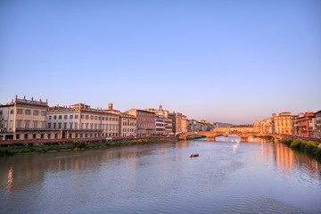 A view of the Arno River and the Ponte Vecchio in Florence, Italy.