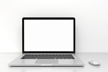 Fototapeta premium Laptop computer with blank white screen and mouse on the white table. screen mockup template