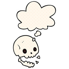 cartoon spooky skull and thought bubble in comic book style