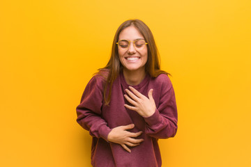 Young casual woman laughing and having fun