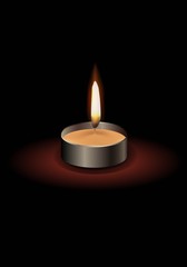 Small candle with a flame with a dark background