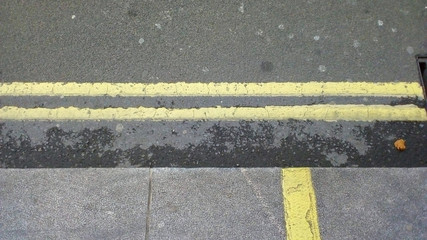Fototapeta premium double yellow street lines road marking
