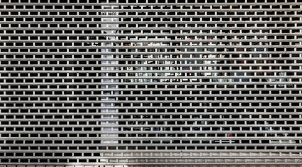 Protective grid in front of a shop window