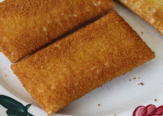 kaassoufflé, a Dutch snack of melted cheese inside a thin dough-based wrap