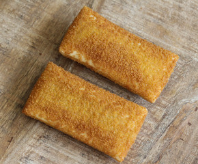 kaassoufflé, a Dutch snack of melted cheese inside a thin dough-based wrap