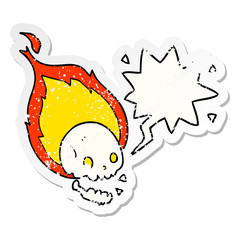spooky cartoon flaming skull and speech bubble distressed sticker
