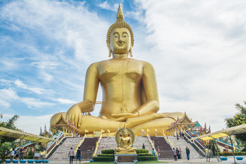 Ang Thong, Thailand - Juner 22, 2019: Big golden sitting Buddha at Wat Muang temple in Thailand