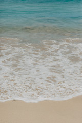 ocean landscape. sand beach and water of blue ocean