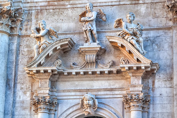 Bas-relief with three angels. Dubrovnik, Croatia