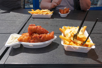 Kibbelings deep fried fish with fries and tartar sauce a dish in Breskens, Netherlands