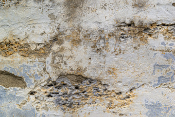 The texture of the old concrete wall. Raw plaster wall background. The wall is made of natural stone shell rock.
