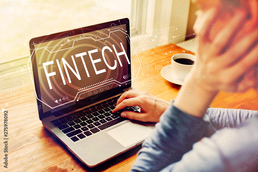 Poster fintech concept with man using a laptop computer
