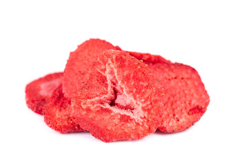 Obraz premium Dried strawberry slices isolated on white background. Dehydrated strawberries chips.