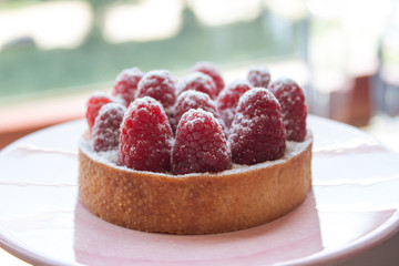 Fresh raspberry tartlet.