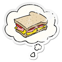 cartoon ham sandwich and thought bubble as a distressed worn sticker