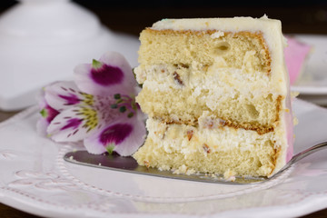 Delicious cake with fresh flowers