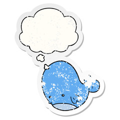 cartoon whale and thought bubble as a distressed worn sticker