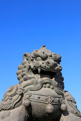 giant lion sculptures under blue sky, tangshan city, China