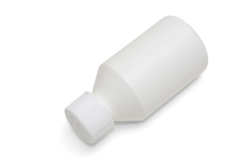 the plastic small bottle of white color isolated on a white background with a shadow