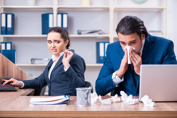 Two employees suffering at workplace 