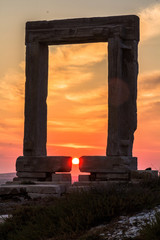 Sunset at the Portara in Naxos, Aegean in Greece
