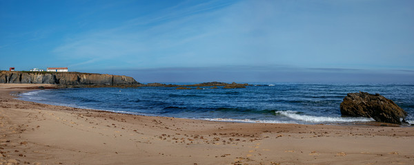 Panoramic landscape photography with Atlantic ocean, beach with rocks and cliffs near Almograve, Odemira, Portugal