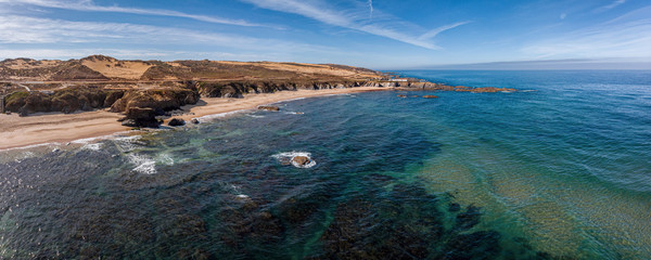 Aerial panoramic landscape photography with Atlantic ocean, rocks and cliffs near Almograve, Odemira, Portugal