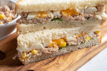 Tuna fish sandwich with egg and corn