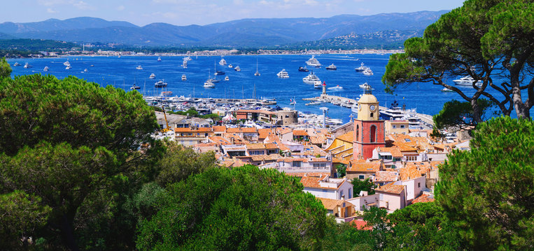 View to saint-tropez city from sea with luxury yacht