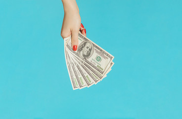 Cash US dollars. Dollar currency. Women hands holding a money.