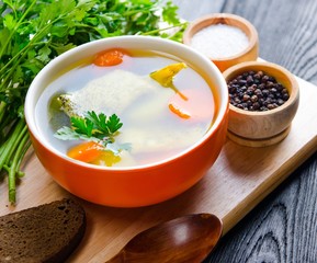 Fish soup served on the table in plate